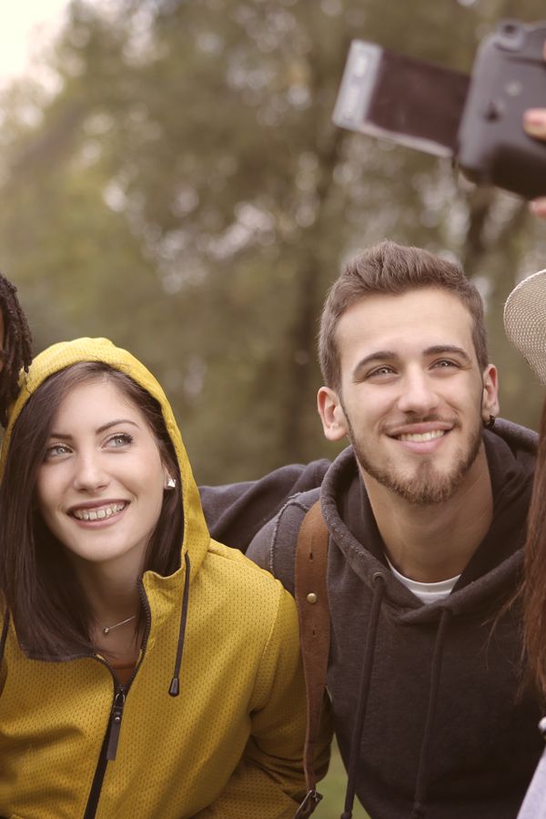 Friends sharing a happy moment in the park